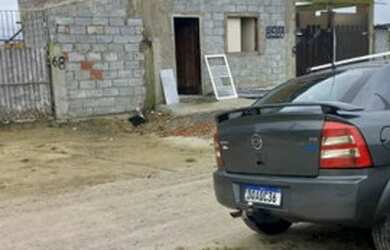 Imagem: A casa possui 2 Dormitórios, 2 Banheiros e está localizado