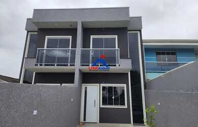 Imagem: A casa possui 3 Dormitórios, 1 Banheiro, 2 Vagas na garagem