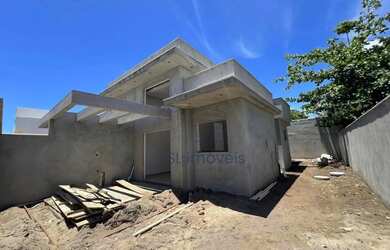 Imagem: A casa possui 2 Dormitórios, 2 Banheiros, 3 Vagas na garagem