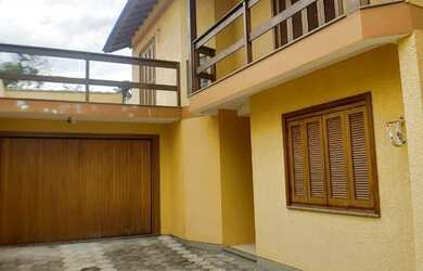 Imagem 1: Casa em Guarujá. Varanda, 164m² de Área, 2 Vagas na garageme2 Dormitórios