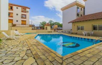 Imagem: O apartamento possui 2 Dormitórios, 1 Banheiro, 1 Vaga na garagem