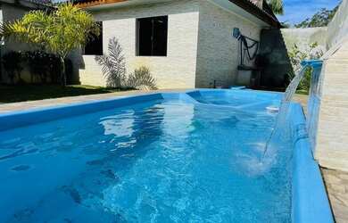 Imagem: A casa possui 3 Dormitórios, 1 Banheiro, 4 Vagas na garagem