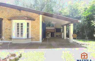 Imagem: A casa possui 2 Dormitórios, 1 Banheiro, 3 Vagas na garagem