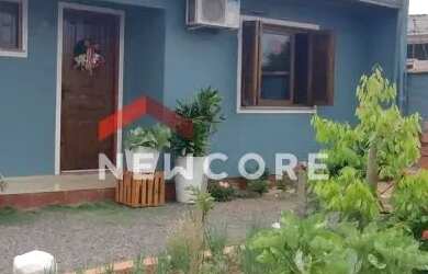 Imagem: A casa possui 3 Dormitórios, 2 Banheiros, 1 Vaga na garagem