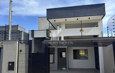 Imagem: A casa possui 3 Dormitórios, 2 Banheiros, 2 Vagas na garagem