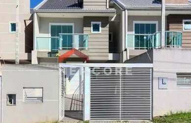 Imagem: A casa possui 3 Dormitórios, 3 Banheiros, 2 Vagas na garagem