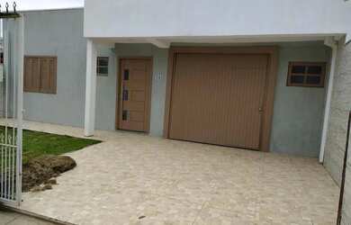 Imagem: A casa possui 2 Dormitórios, 2 Banheiros, 1 Vaga na garagem