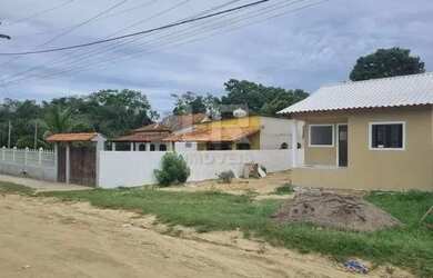 Imagem: A casa possui 2 Dormitórios, 2 Banheiros, 3 Vagas na garagem