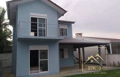 Imagem: A casa possui 3 Dormitórios, 3 Banheiros, 2 Vagas na garagem