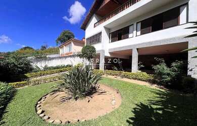 Imagem: A casa possui 3 Dormitórios, 5 Banheiros, 5 Vagas na garagem