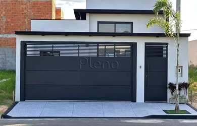 Imagem: A casa possui 3 Dormitórios, 3 Banheiros, 2 Vagas na garagem