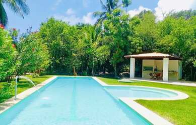 Imagem: A casa possui 5 Dormitórios, 5 Banheiros, 2 Vagas na garagem