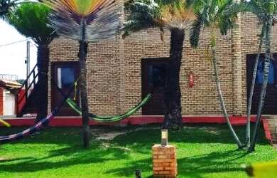 Imagem: A casa possui 3 Dormitórios, 3 Vagas na garagem e está localizado