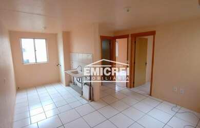 Imagem: O apartamento possui 2 Dormitórios, 1 Banheiro, 1 Vaga na garagem