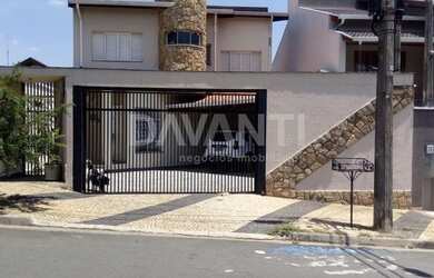 Imagem: A casa possui 3 Dormitórios, 4 Banheiros, 4 Vagas na garagem