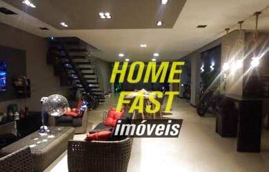 Imagem: A casa possui 3 Dormitórios, 3 Banheiros, 5 Vagas na garagem