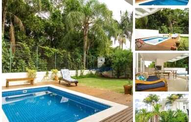 Imagem: A casa possui 4 Dormitórios, 5 Banheiros, 4 Vagas na garagem