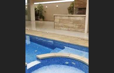 Imagem: A casa em condomínio possui 5 Dormitórios, 5 Banheiros, 4