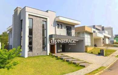 Imagem: A casa em condomínio possui 5 Dormitórios, 5 Banheiros, 4