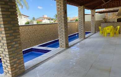 Imagem: A casa possui 5 Dormitórios, 5 Banheiros, 5 Vagas na garagem