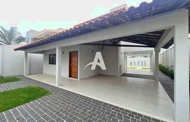 Imagem: A casa possui 3 Dormitórios, 3 Banheiros, 4 Vagas na garagem