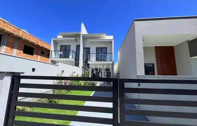 Imagem: A casa possui 2 Dormitórios, 2 Banheiros, 2 Vagas na garagem