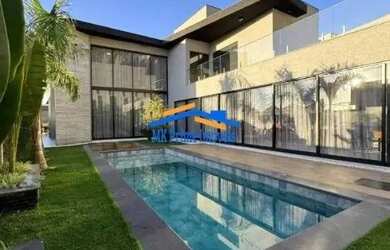 Imagem: A casa em condomínio possui 4 Dormitórios, 5 Banheiros, 5