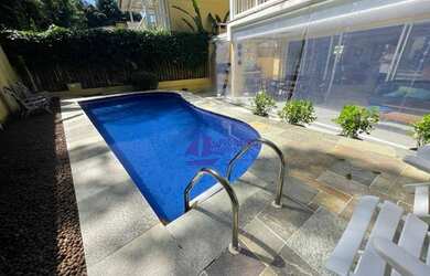 Imagem: A casa em condomínio possui 5 Dormitórios, 5 Banheiros, 3