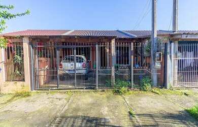 Imagem: A casa possui 2 Dormitórios, 1 Banheiro, 1 Vaga na garagem