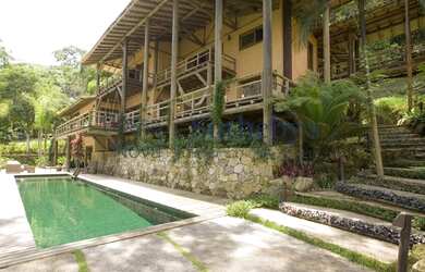 Imagem: A casa possui 5 Dormitórios, 5 Banheiros, 3 Vagas na garagem