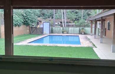 Imagem: A casa em condomínio possui 5 Dormitórios, 5 Banheiros, 5