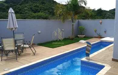 Imagem: A casa em condomínio possui 4 Dormitórios, 2 Banheiros, 4