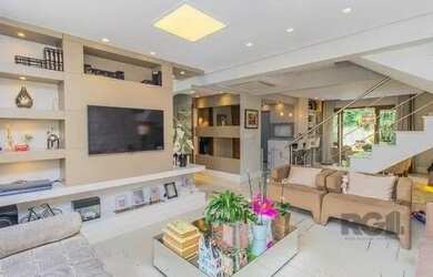 Imagem: A casa em condomínio possui 4 Dormitórios, 5 Banheiros, 2