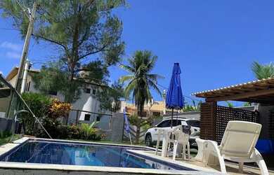 Imagem: A casa possui 3 Dormitórios, 3 Banheiros, 3 Vagas na garagem