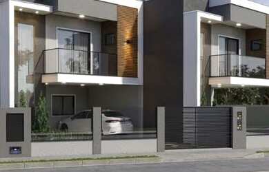 Imagem: A casa possui 3 Dormitórios, 3 Banheiros, 2 Vagas na garagem