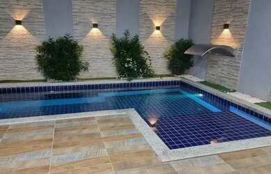 Imagem: A casa possui 4 Dormitórios, 3 Banheiros, 3 Vagas na garagem