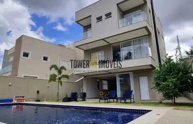 Imagem: A casa em condomínio possui 3 Dormitórios, 5 Banheiros, 4