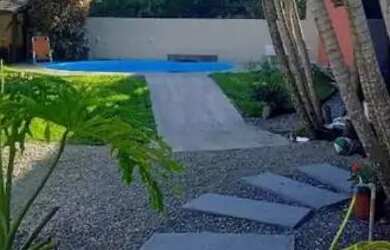 Imagem: A casa possui 3 Dormitórios, 3 Banheiros, 2 Vagas na garagem