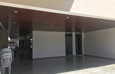 Imagem: A casa possui 5 Dormitórios, 5 Banheiros, 3 Vagas na garagem