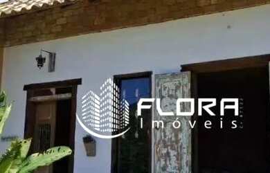 Imagem: A casa possui 4 Dormitórios, 2 Banheiros, 3 Vagas na garagem