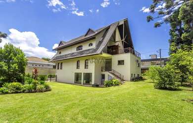 Imagem: A casa possui 5 Dormitórios, 5 Banheiros, 5 Vagas na garagem