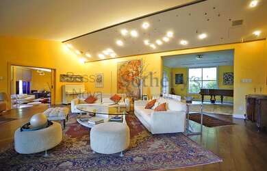 Imagem 6: Casa com piscina e quadra poliesportiva