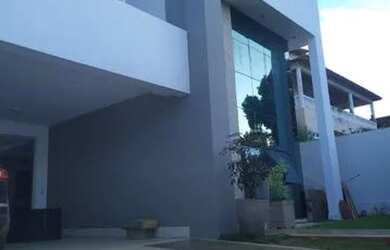 Imagem: A casa possui 4 Dormitórios, 5 Banheiros, 4 Vagas na garagem