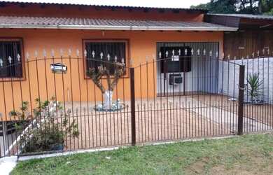 Imagem: A casa possui 2 Dormitórios, 2 Banheiros, 1 Vaga na garagem