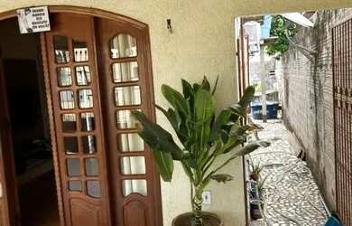 Imagem: A casa possui 4 Dormitórios e 3 Banheiros e está localizado