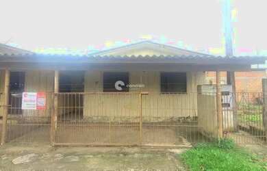 Imagem: A casa possui 2 Dormitórios, 1 Banheiro, 1 Vaga na garagem