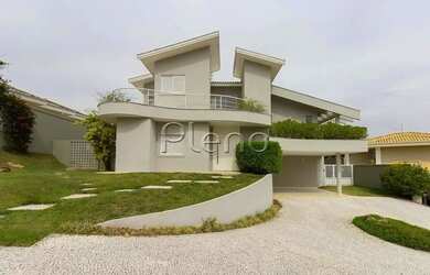 Imagem: A casa possui 5 Dormitórios, 3 Banheiros, 4 Vagas na garagem