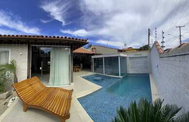 Imagem: A casa possui 5 Dormitórios, 5 Banheiros, 2 Vagas na garagem