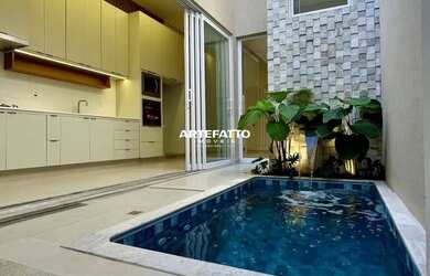 Imagem: A casa possui 2 Dormitórios, 3 Banheiros, 2 Vagas na garagem