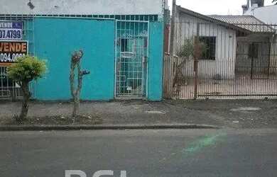 Imagem: A casa possui 3 Dormitórios, 2 Banheiros, 1 Vaga na garagem